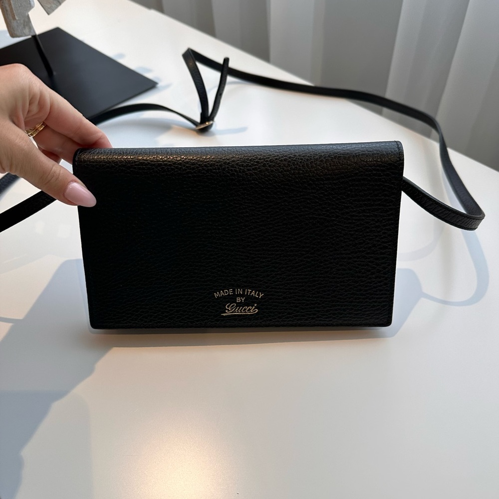 Black Gucci wallet on chain NEGOTIABLE